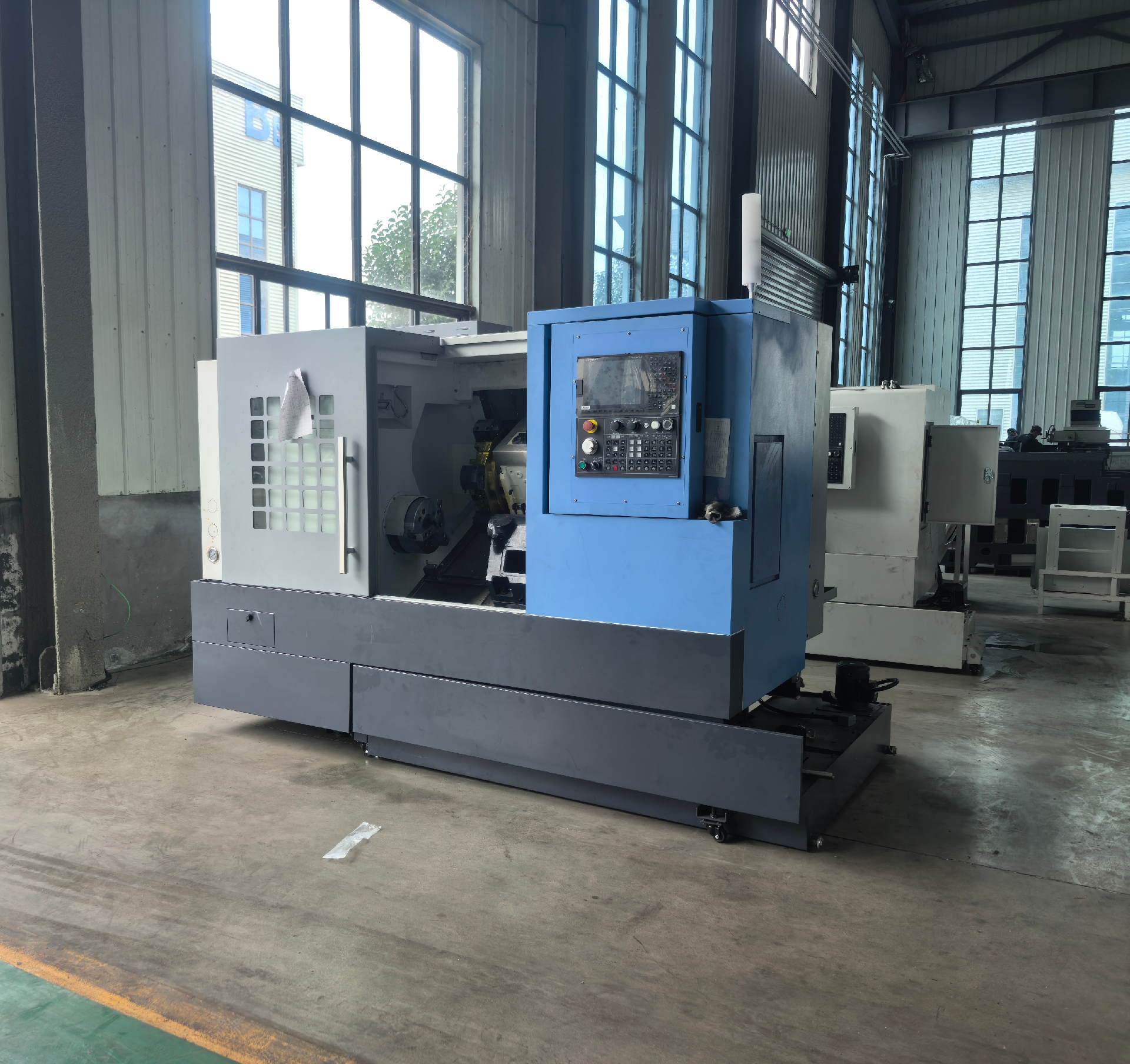 Токарный станок с наклонной станиной TCK6050
