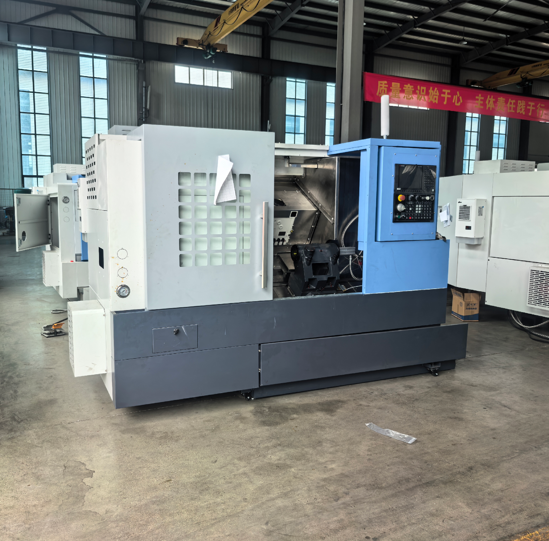 Токарный станок с наклонной станиной TCK6050